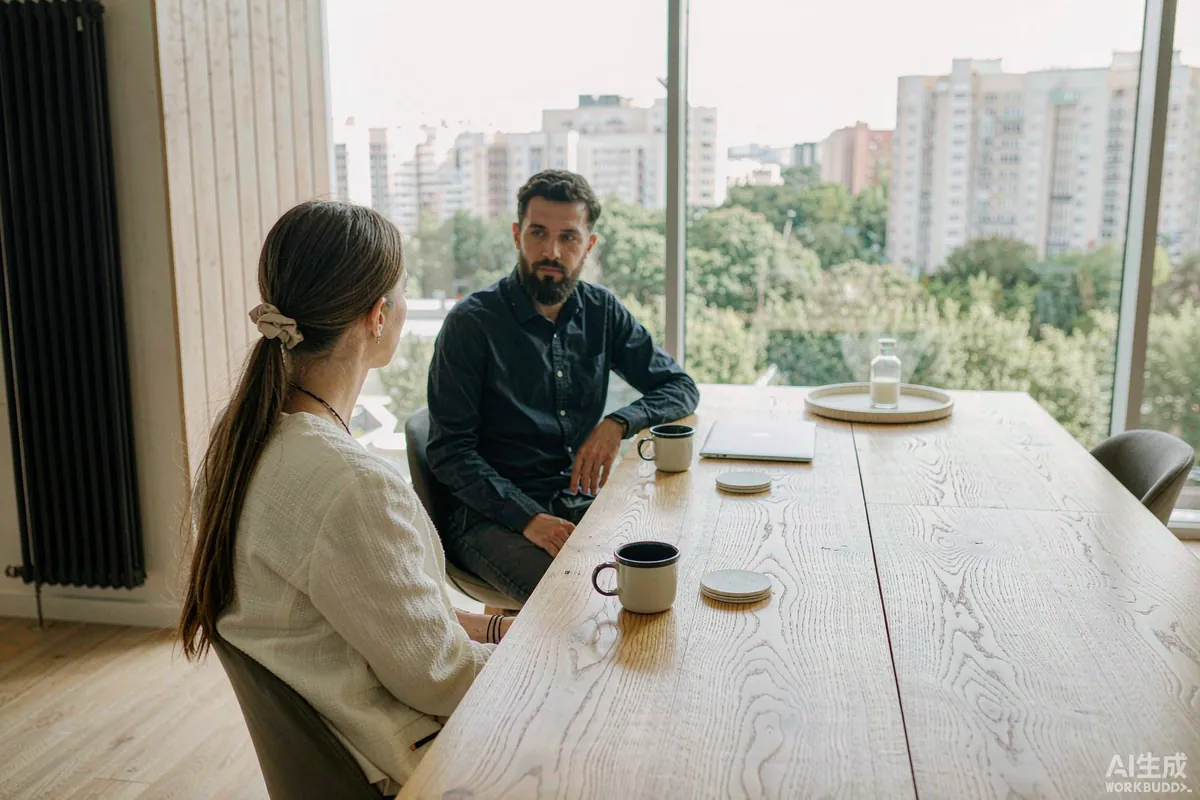 Lending advisor and client discussing financing options at a bright office table