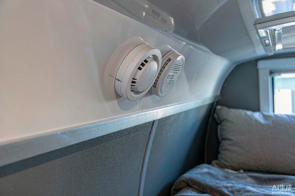 Smoke alarm and carbon monoxide detector mounted on a capsule home ceiling