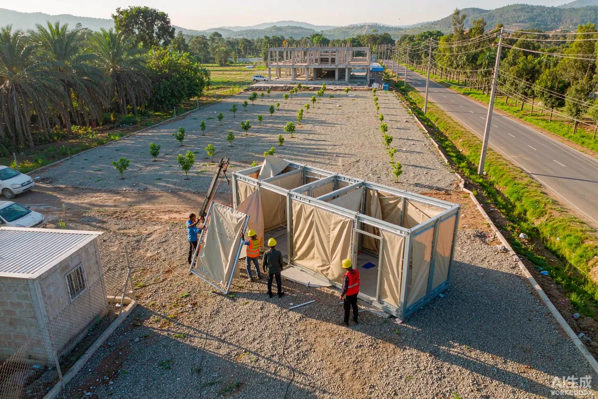 Container sized folded house unit being unfolded by a small crew on a prepared site pad