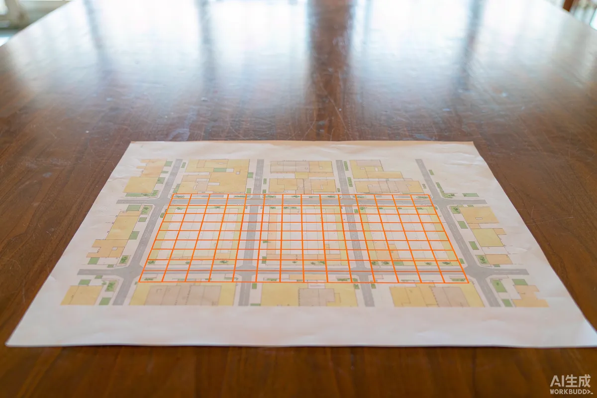 Site plan drawing showing modular unit layout on an architect's table